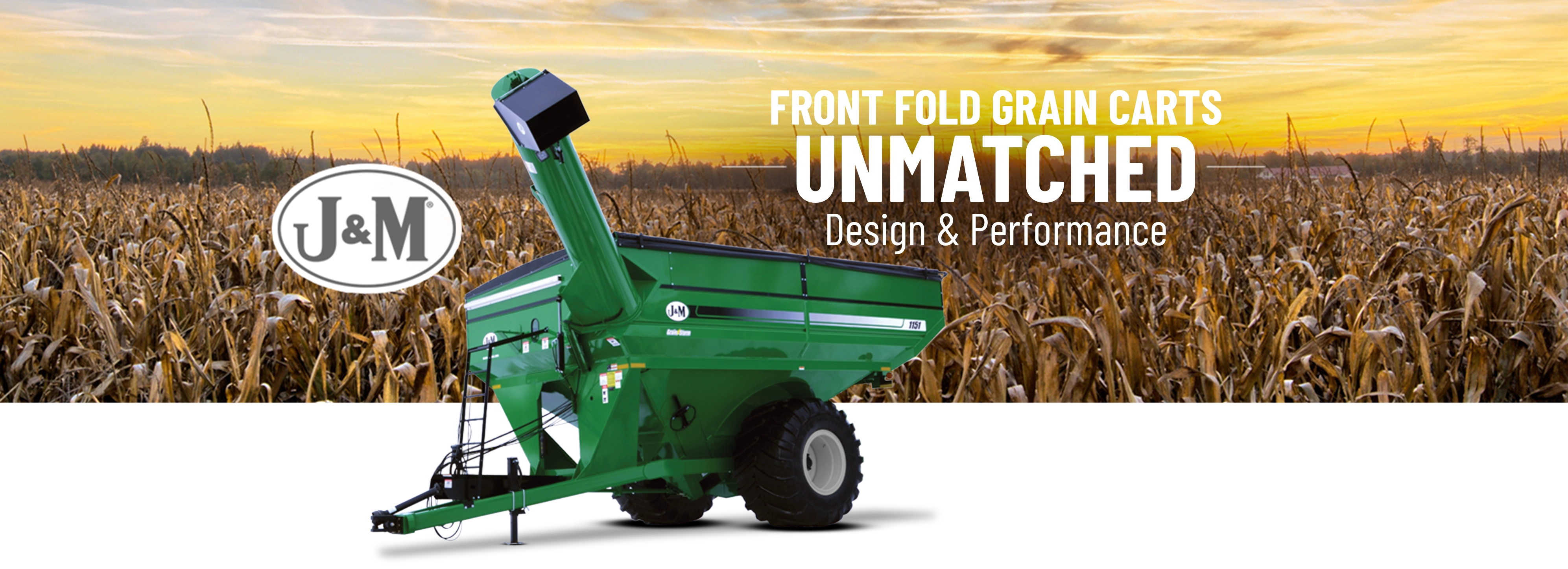 Green Grain Cart in Front of Corn Field