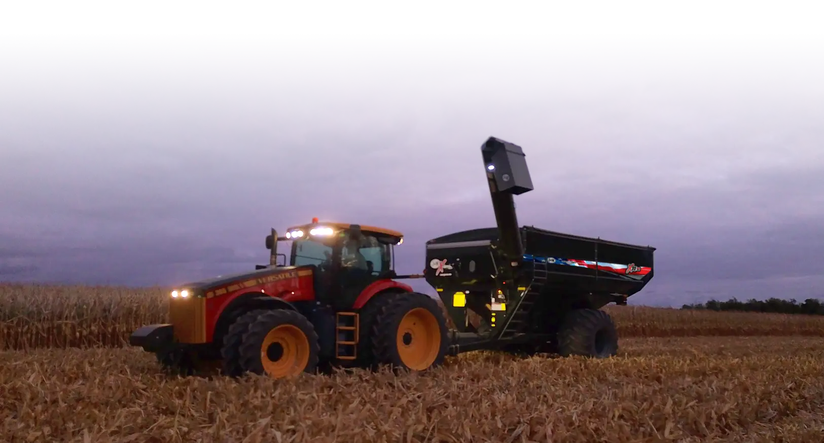 Black Grain Cart in Field