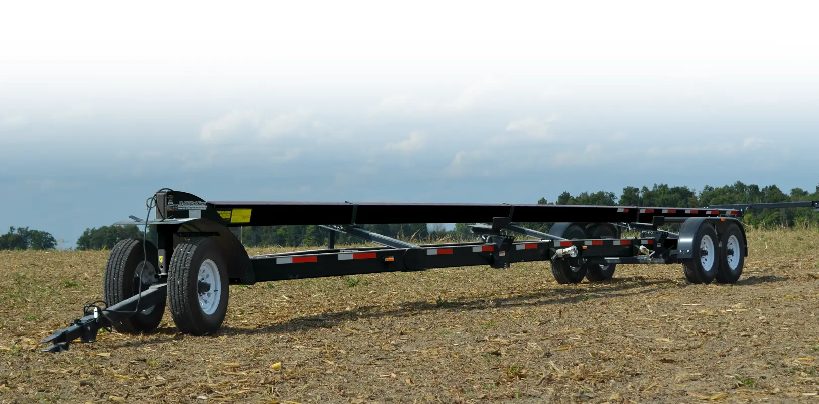 Trail-Blazer Header Transport in a Field