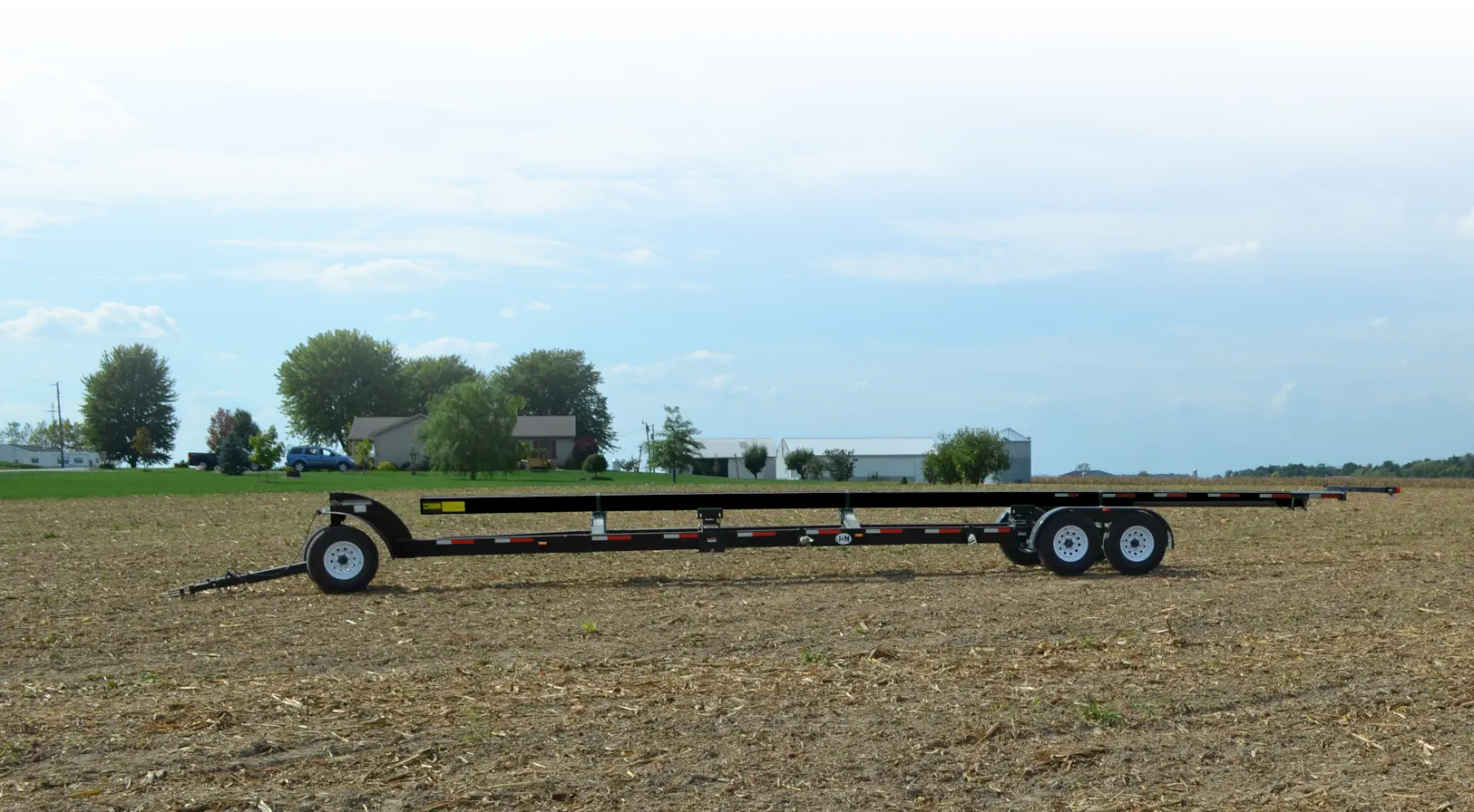 Trail-Blazer Header Transport in a Field