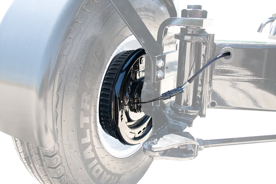 close up of the brake drum of a 4 wheel steer header transport