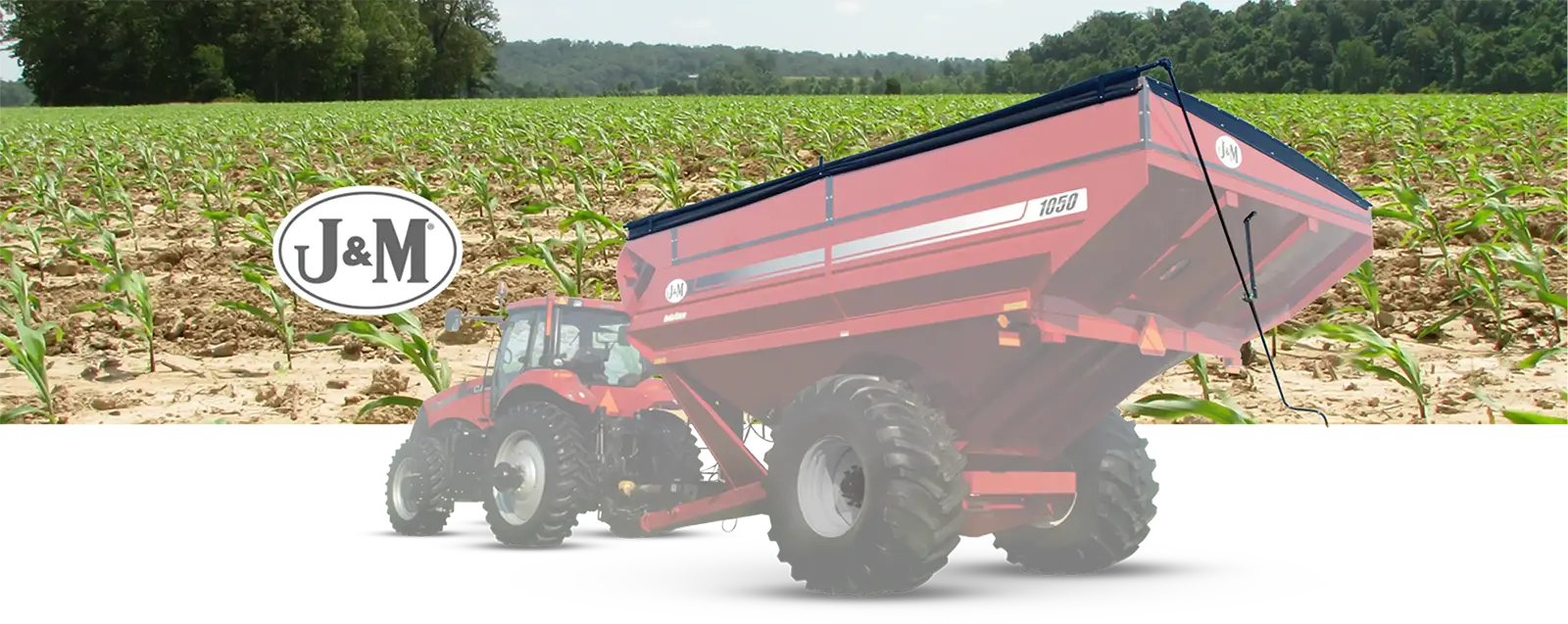 Extended Reach red Grain Cart Picture sitting in front of a corn field