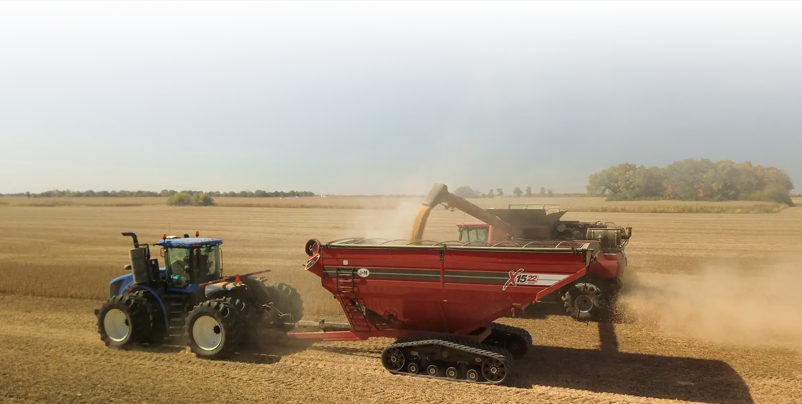 Green Grain Cart Picture featuring stabilizer tracks